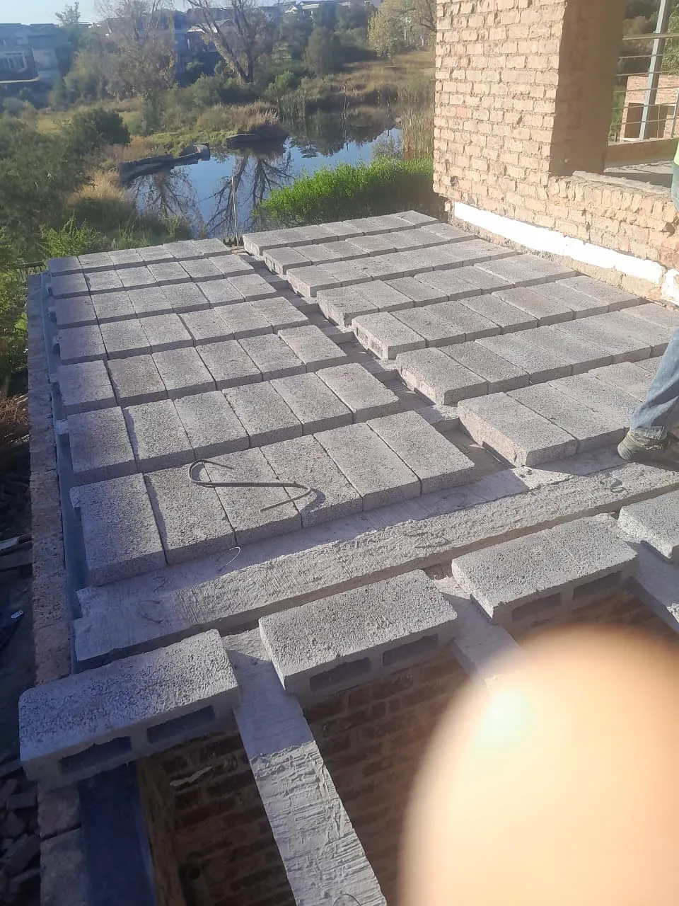 Cast concrete suspended slab on a residential structure